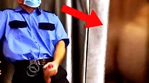 Impudent security guard spies exposed to a customer and jerks off right in the store