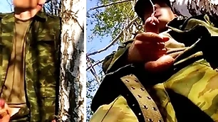 Russian soldier with a big dick chiefly a military mission less a difficulty forest shoots sperm from his penis at opponents