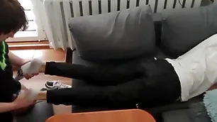 Young person pays extensively his bills with his feet