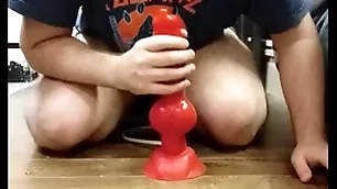 I play with my huge dilto coupled with i cum in my chastity coop up