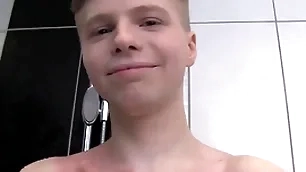 Cute buttery boy alone in a shower