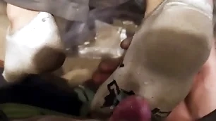 Two young guys dirty socks footjob