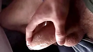 Rub-down the guy's big dick got up and he has to shoot cum, close-up, moaning